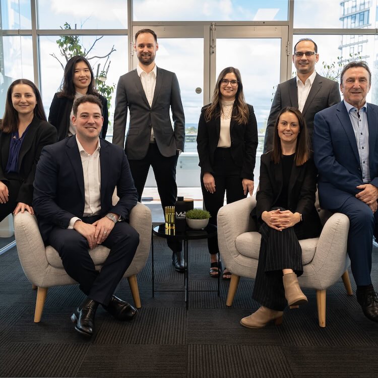 m2-corporate-team-square Team of business advisors and business accountants arranged for a team photo